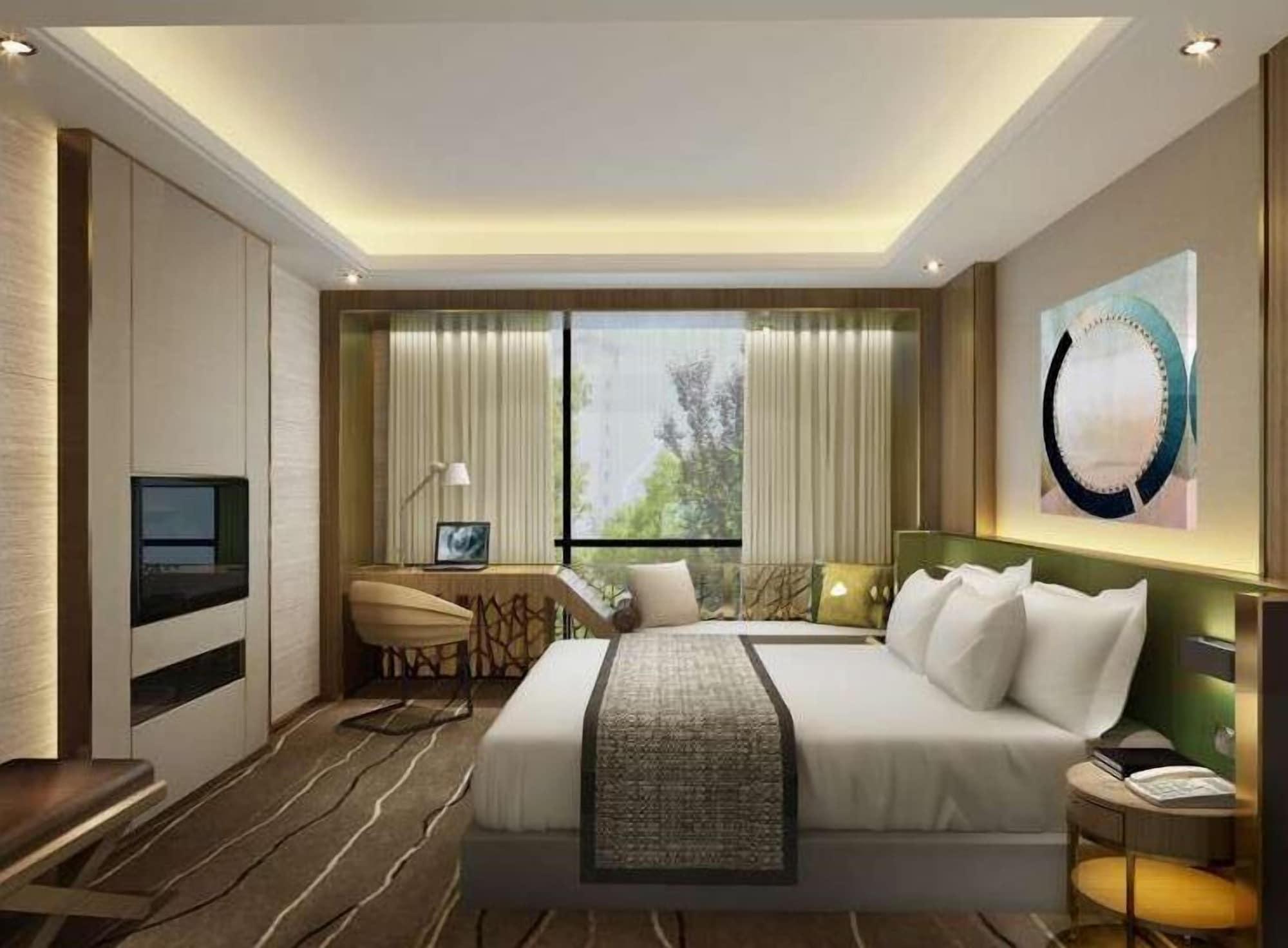 Leshan Ramada Hotel Bagian luar foto