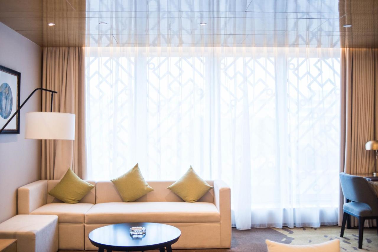 Leshan Ramada Hotel Bagian luar foto