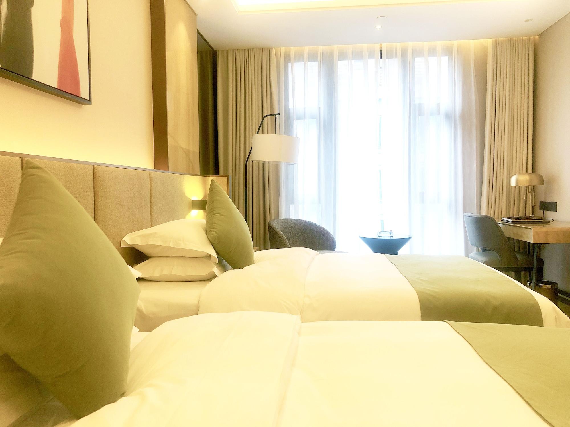 Leshan Ramada Hotel Bagian luar foto