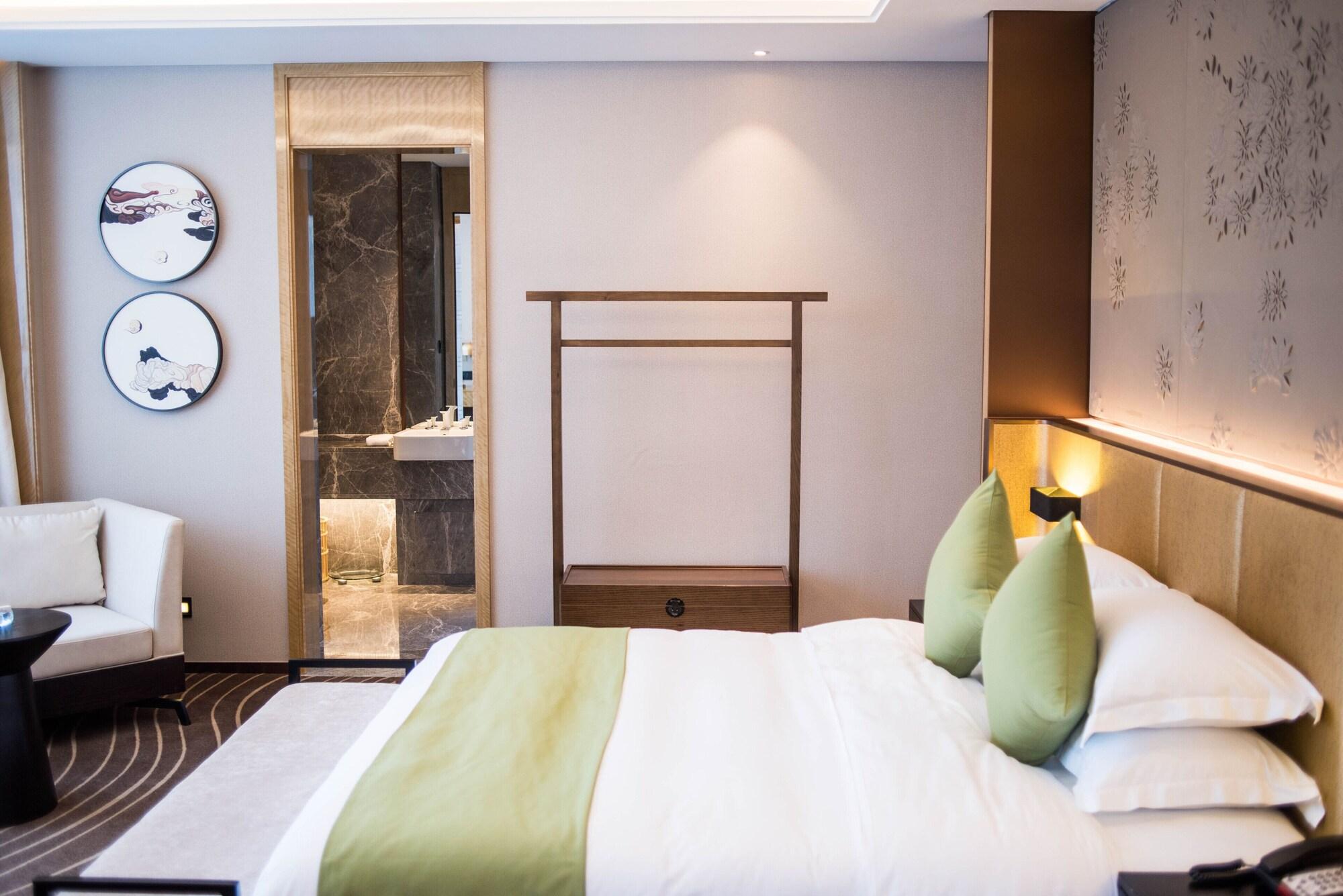 Leshan Ramada Hotel Bagian luar foto