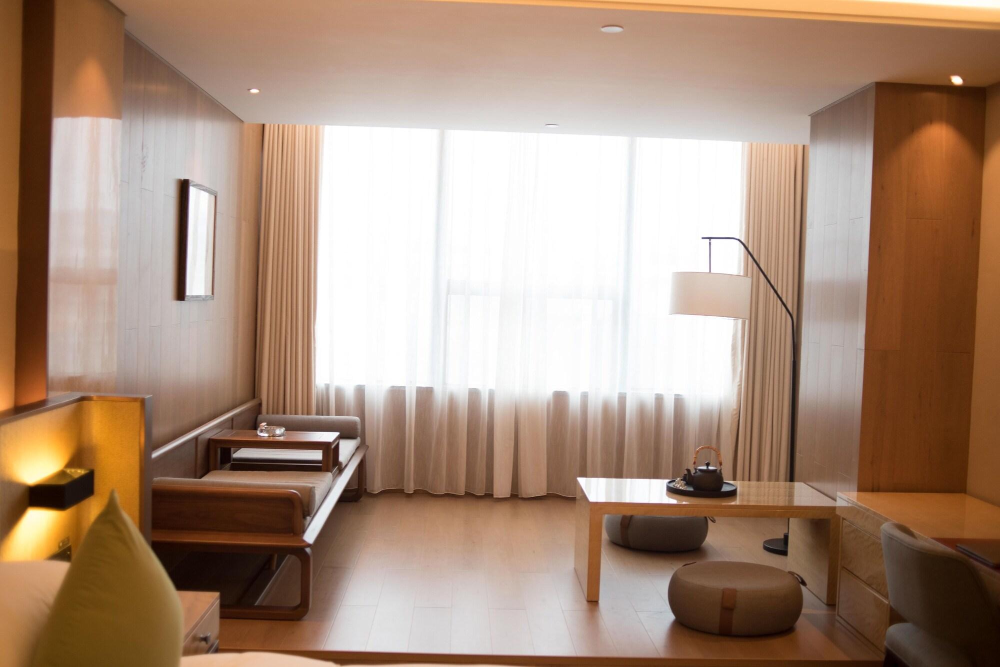 Leshan Ramada Hotel Bagian luar foto