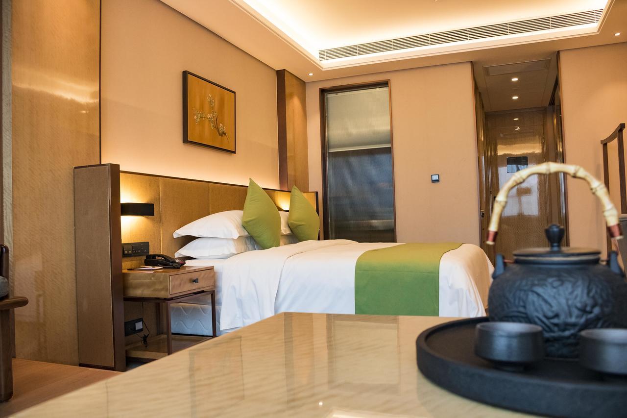 Leshan Ramada Hotel Bagian luar foto