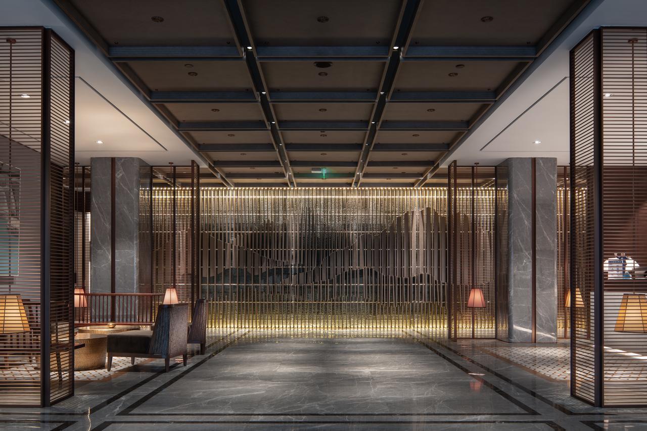 Leshan Ramada Hotel Bagian luar foto