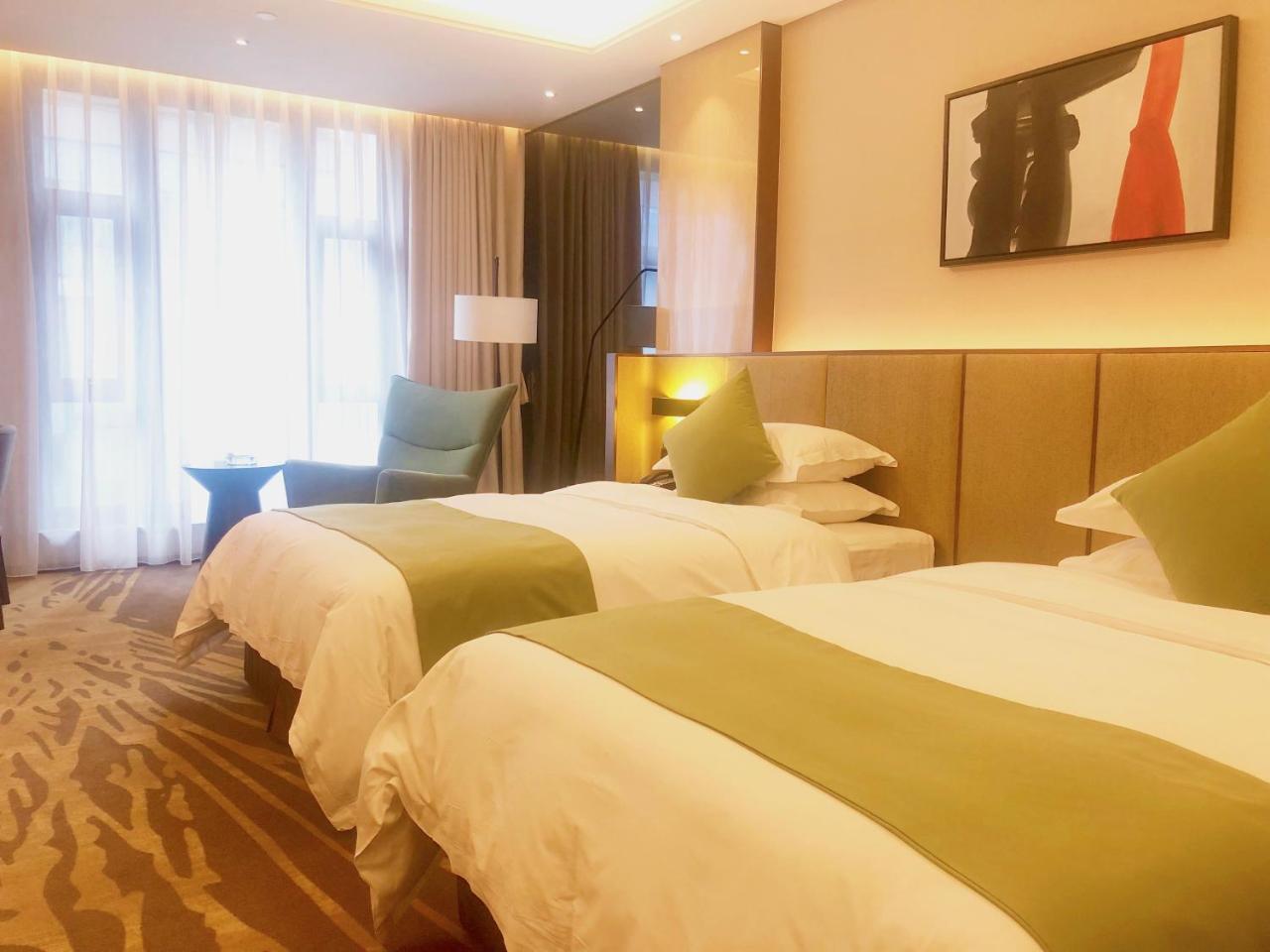 Leshan Ramada Hotel Bagian luar foto